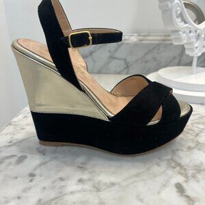 Black suede and gold platform sandals